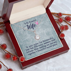 silver necklace with diamond in LED wood box