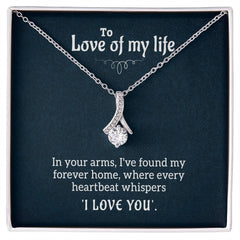 silver necklace with diamond on I love you card