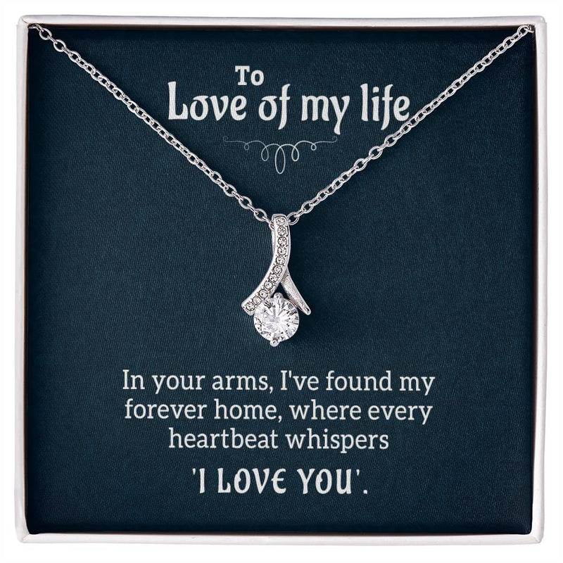 silver necklace with diamond on I love you card